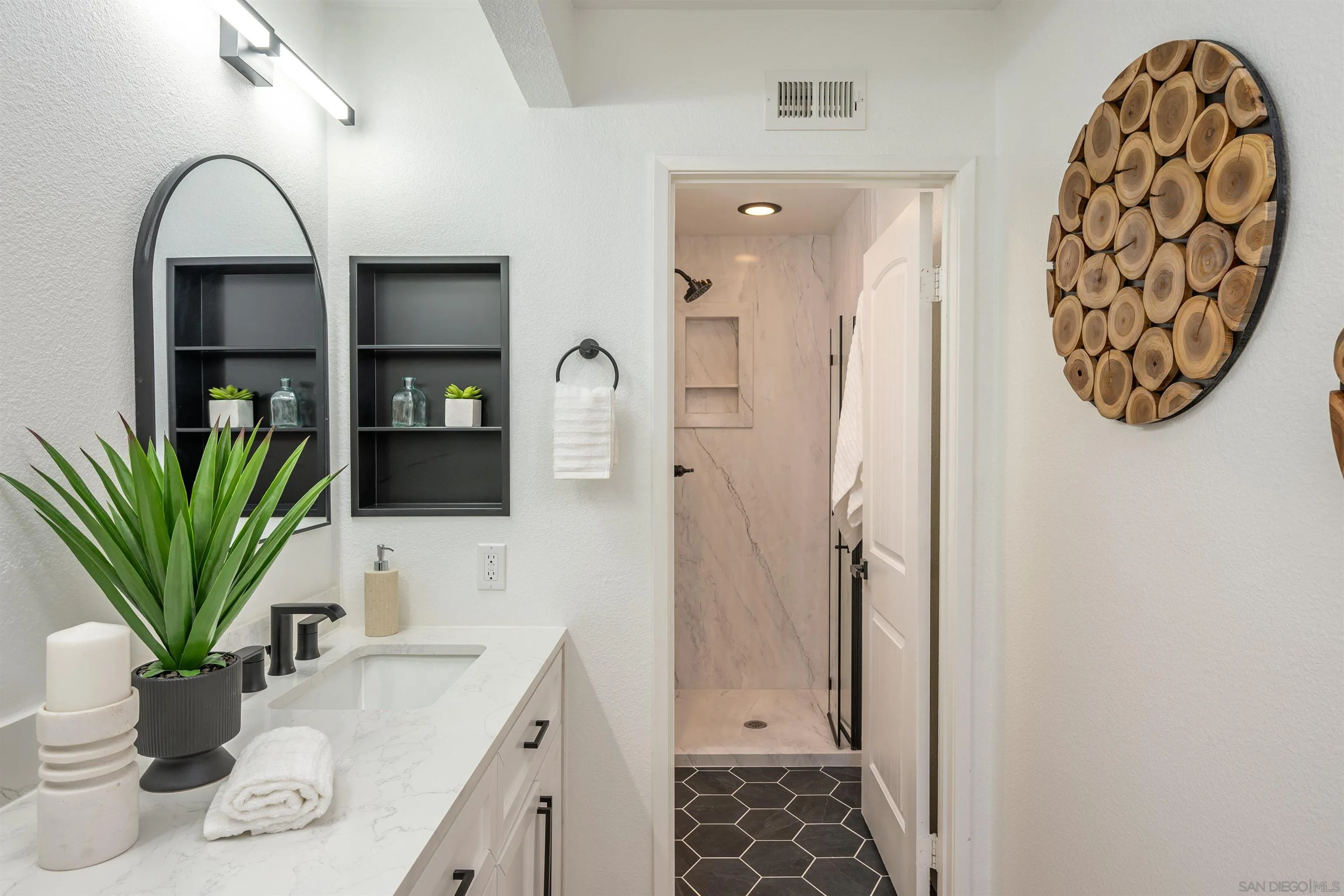 3577 Guava Way Oceanside, CA 92058 - Photo 29 of 42 a view of entryway with wooden floor