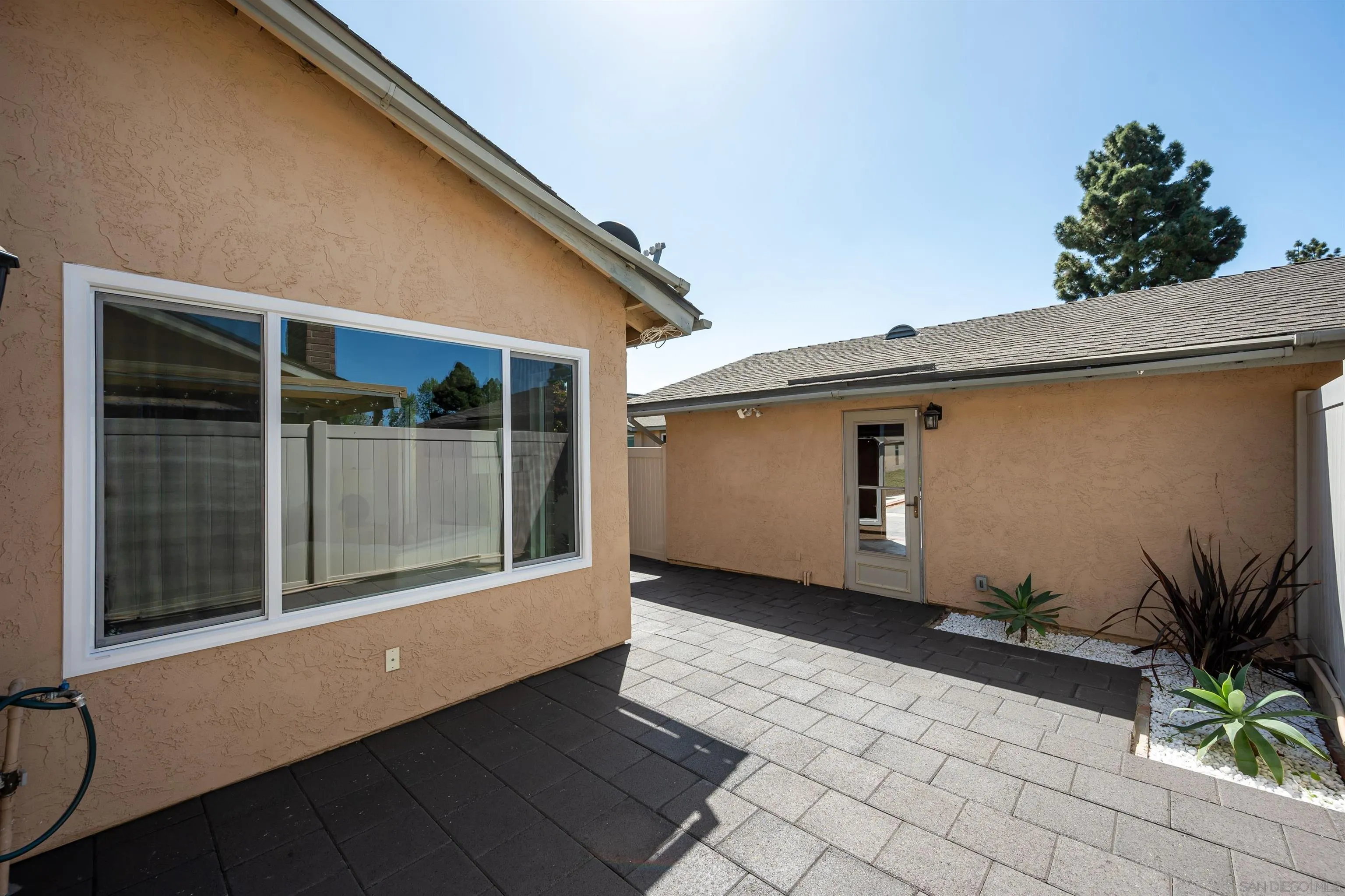 3577 Guava Way Oceanside, CA 92058 - Photo 32 of 42 a view of a house with a yard