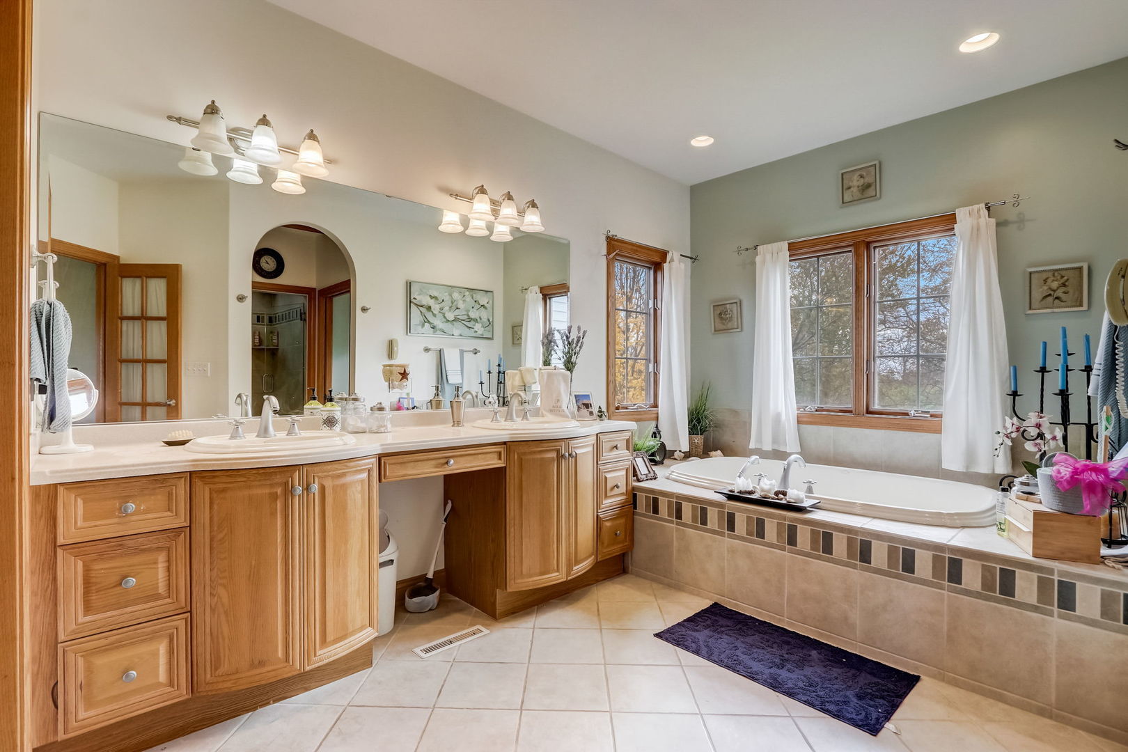 20818 Highview Road Marengo, IL 60152 - Photo 20 of 31 a bathroom with a tub sink and mirror