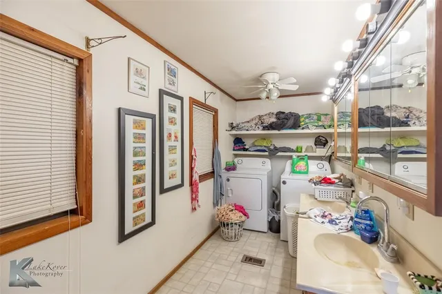 a storage room with washer and dryer