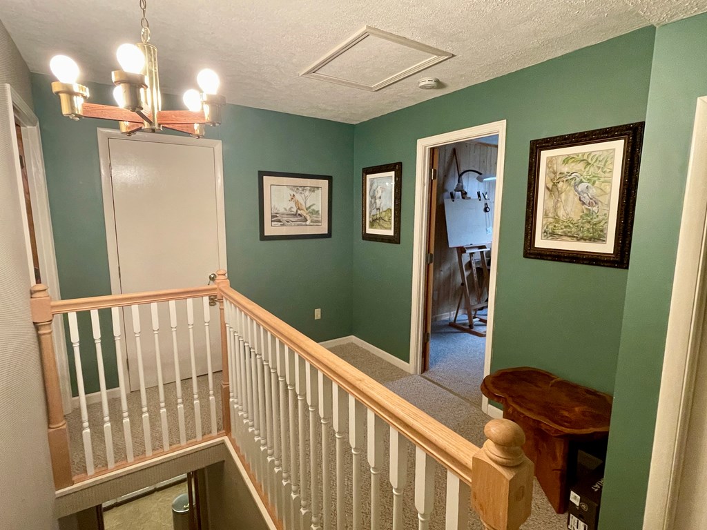 31 River Road Reynolds, GA 31076 - Photo 20 of 22 a view of a hallway with workspace