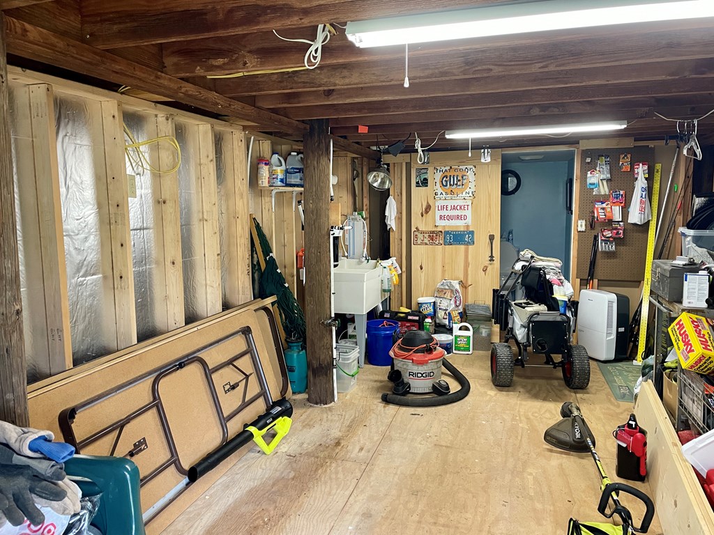 31 River Road Reynolds, GA 31076 - Photo 9 of 22 a view of a room with gym equipment