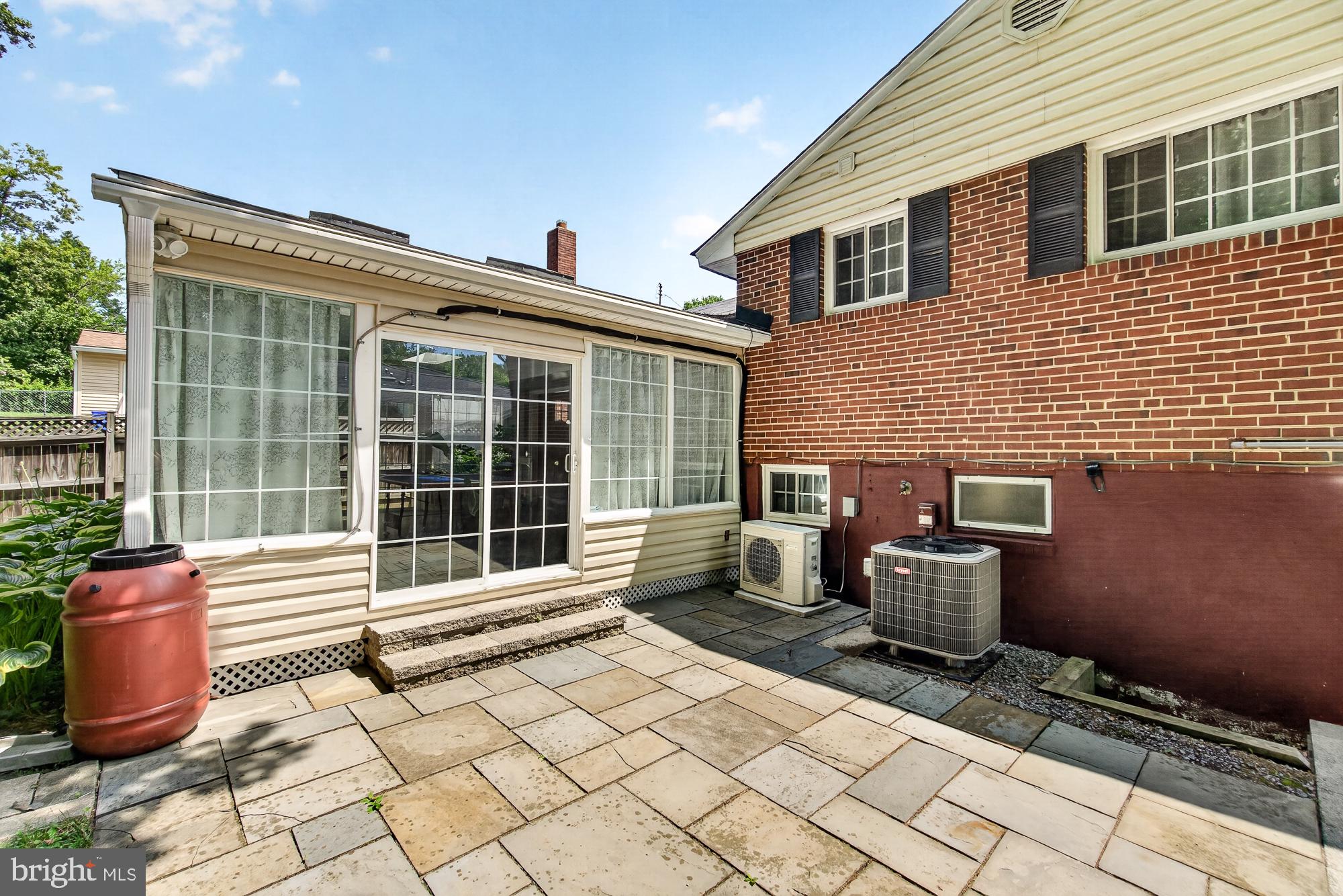 10202 Leslie Street Silver Spring, MD 20910 - Photo 41 of 44 Charming patio with sunlit enclosure.