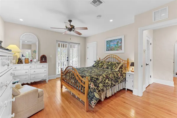 a bed room with a bed and a couch