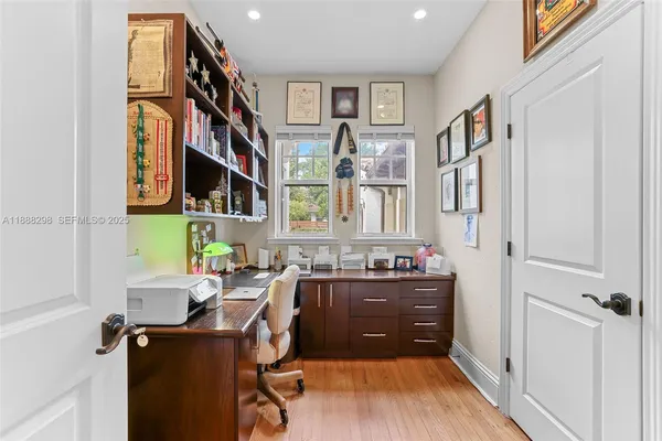 a view of a workspace with furniture and toys