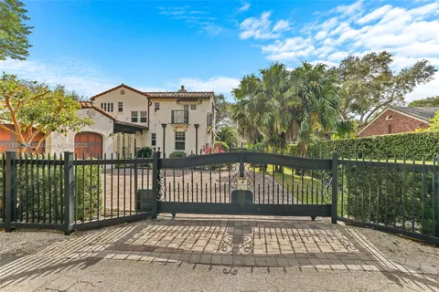 a view of a brick house with a street view