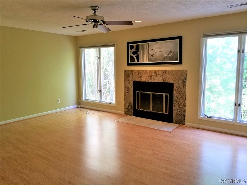 14301 Spring Gate Court Midlothian, VA 23112 - Photo 13 of 30 a view of an empty room with window and fire place