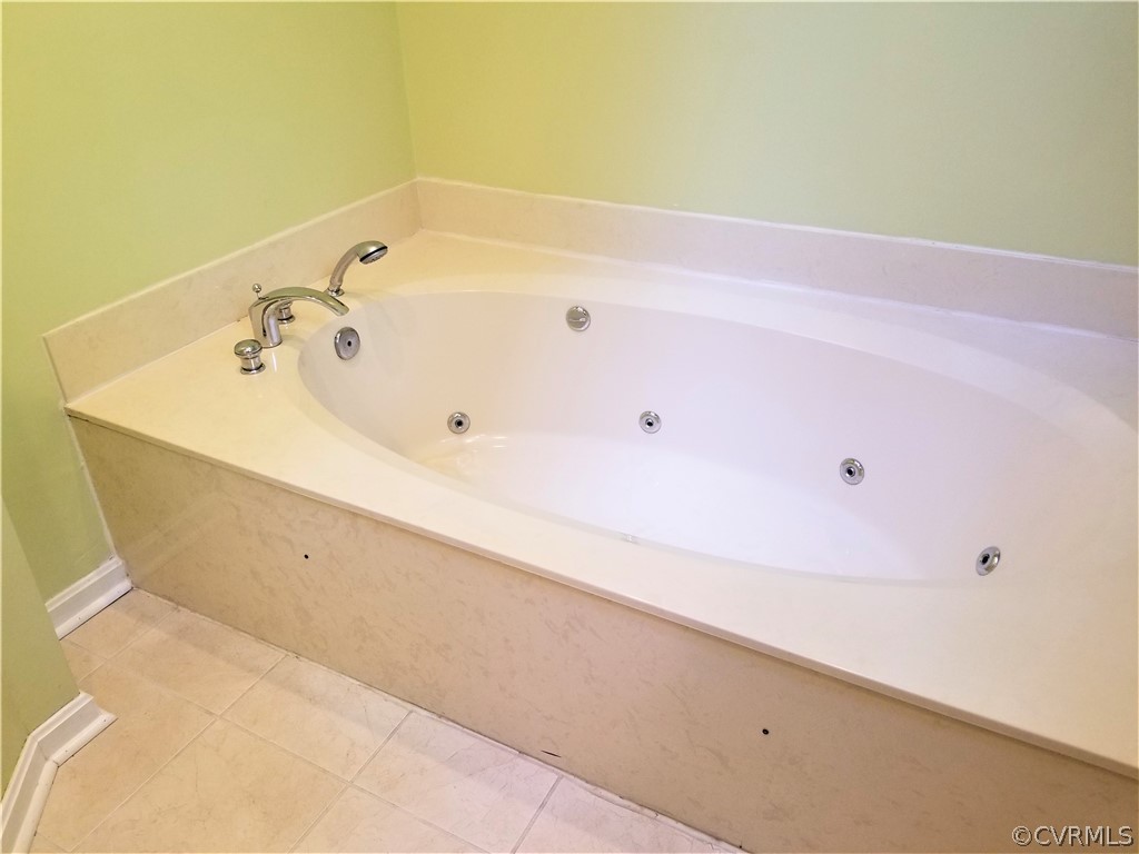 14301 Spring Gate Court Midlothian, VA 23112 - Photo 17 of 30 a bathroom with a bathtub