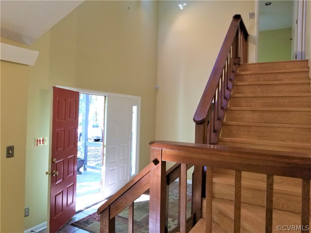 14301 Spring Gate Court Midlothian, VA 23112 - Photo 21 of 30 a view of staircase with wooden floor and stairs