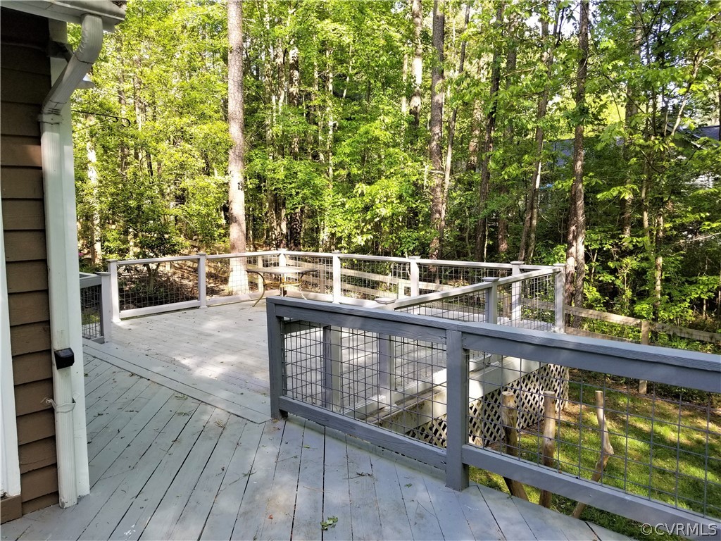14301 Spring Gate Court Midlothian, VA 23112 - Photo 25 of 30 a view of a balcony with wooden floor