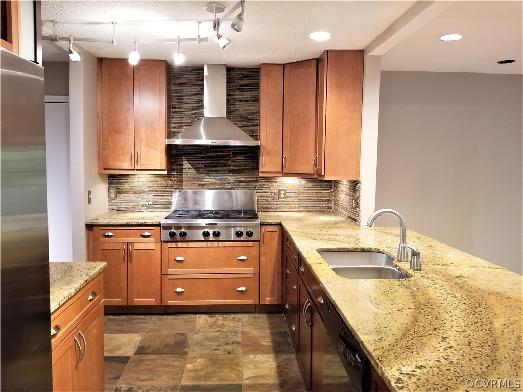 14301 Spring Gate Court Midlothian, VA 23112 - Photo 4 of 30 a kitchen with stainless steel appliances granite countertop a sink stove and refrigerator