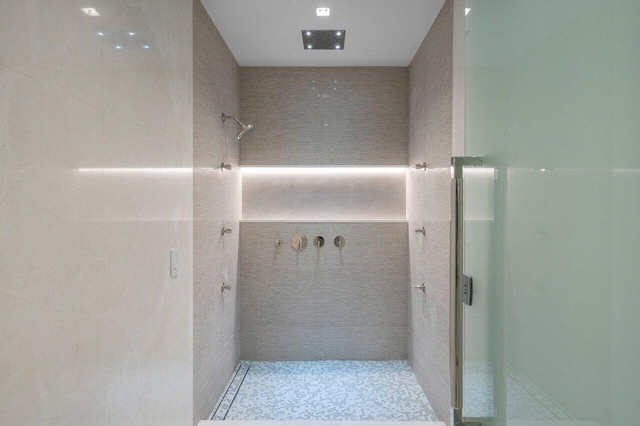 200 Southeast Mizner Boulevard, Unit 211 Boca Raton, FL 33432 - Photo 47 of 67 a bathroom with a shower