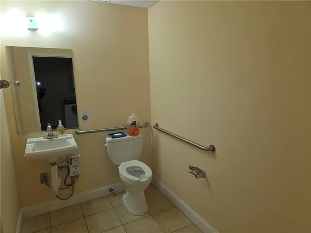 a view of a front door with wooden floor