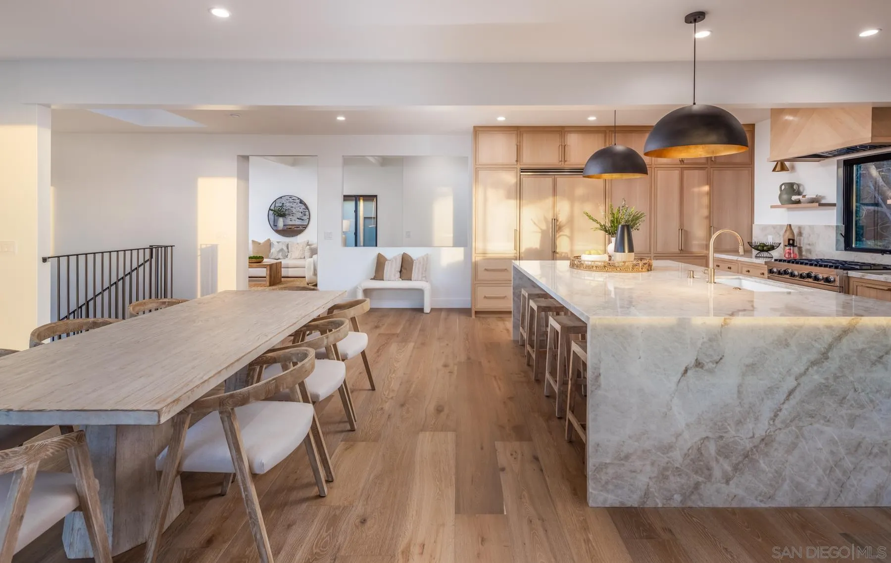 2144 Pinar Place Del Mar, CA 92014 - Photo 11 of 39 a large kitchen with a table and chairs