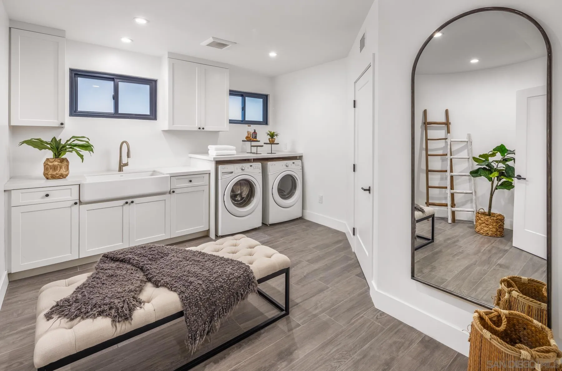 2144 Pinar Place Del Mar, CA 92014 - Photo 30 of 39 a spacious bedroom with a bed and a view of living room