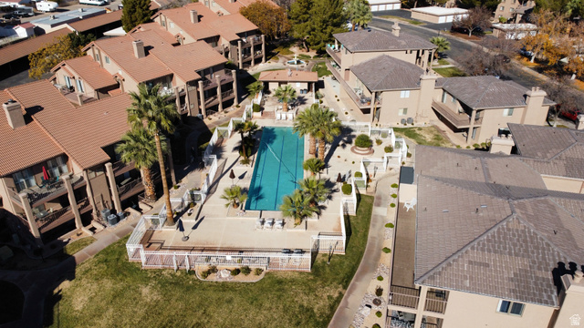 860 South Village Road, Unit Y8 St. George, UT 84770 - Photo 26 of 29 Aerial view of residential area with a pool