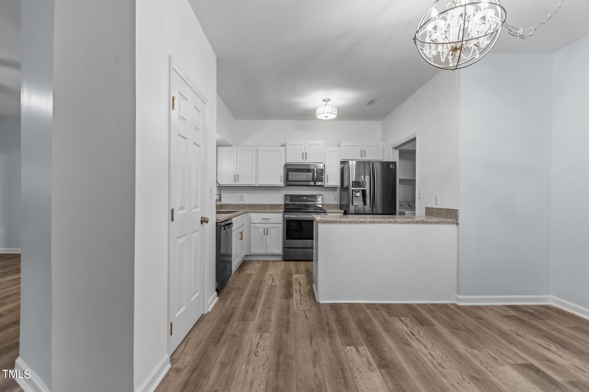 6011 Winterpointe Lane, Unit 101 Raleigh, NC 27606 - Photo 6 of 24 2-web-or-mls-IMGL5761