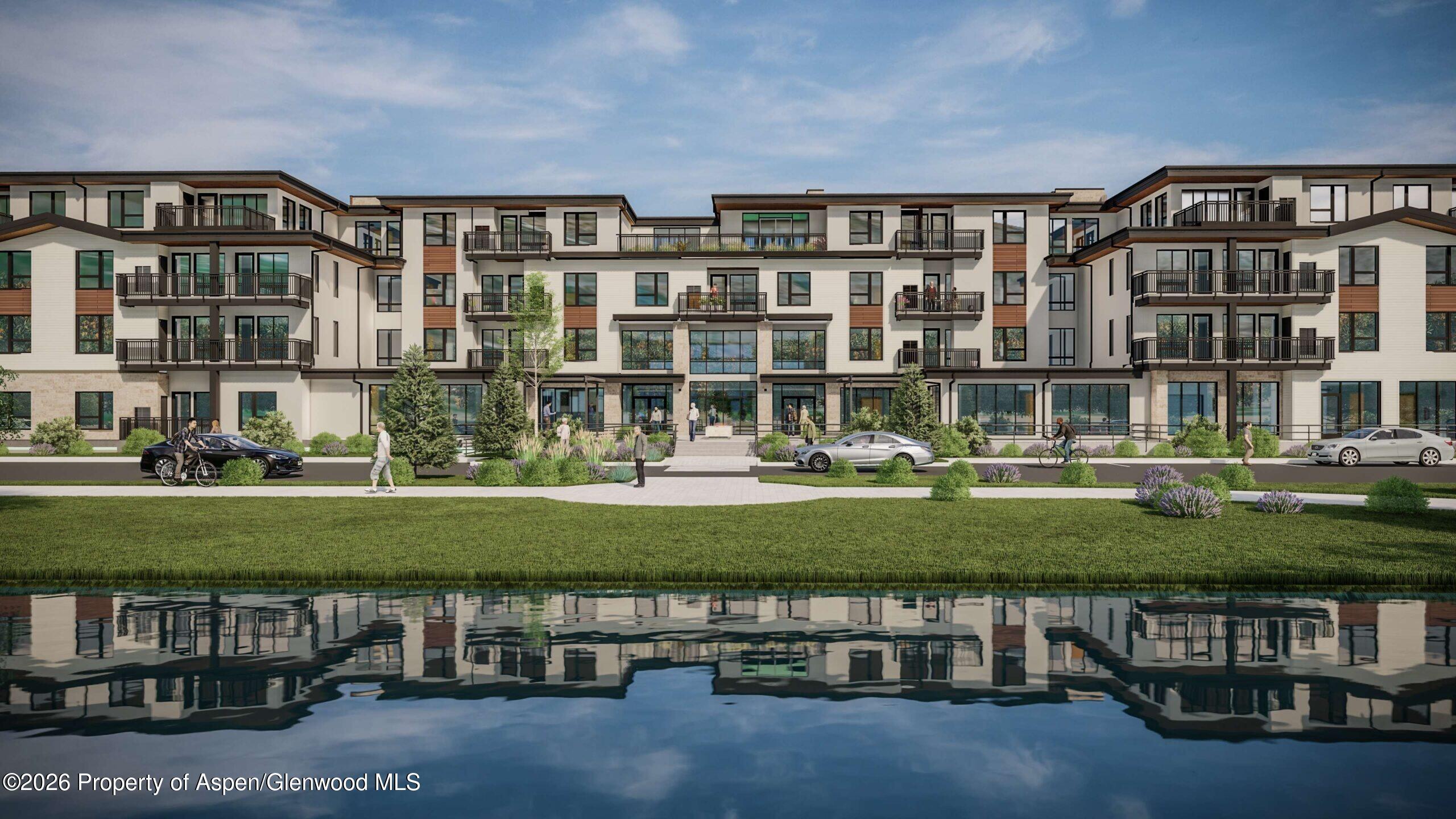 85 Kodiak Drive, Unit 304 Basalt, CO 81621 - Photo 1 of 10 a front view of building with outdoor space
