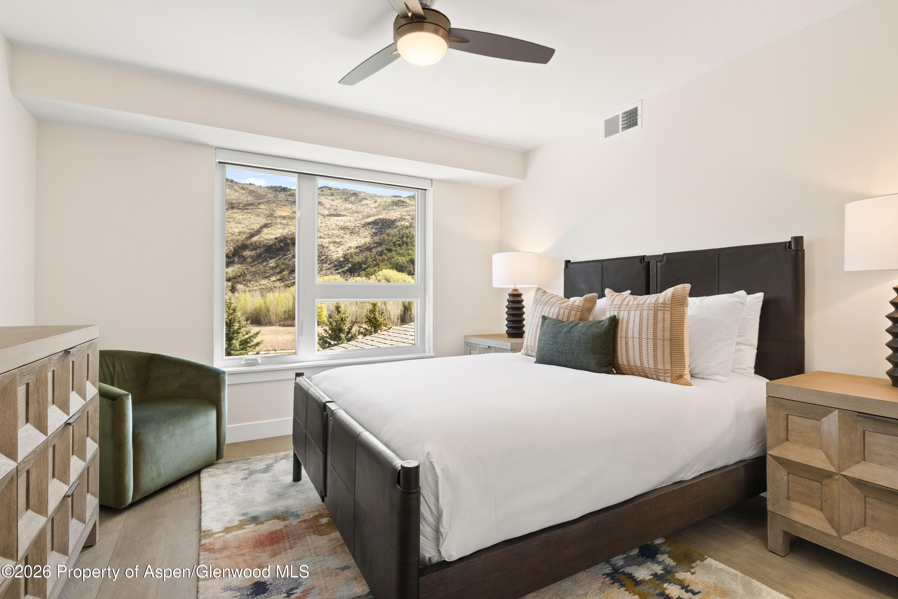 85 Kodiak Drive, Unit 304 Basalt, CO 81621 - Photo 11 of 21 a bedroom with a large bed and a window
