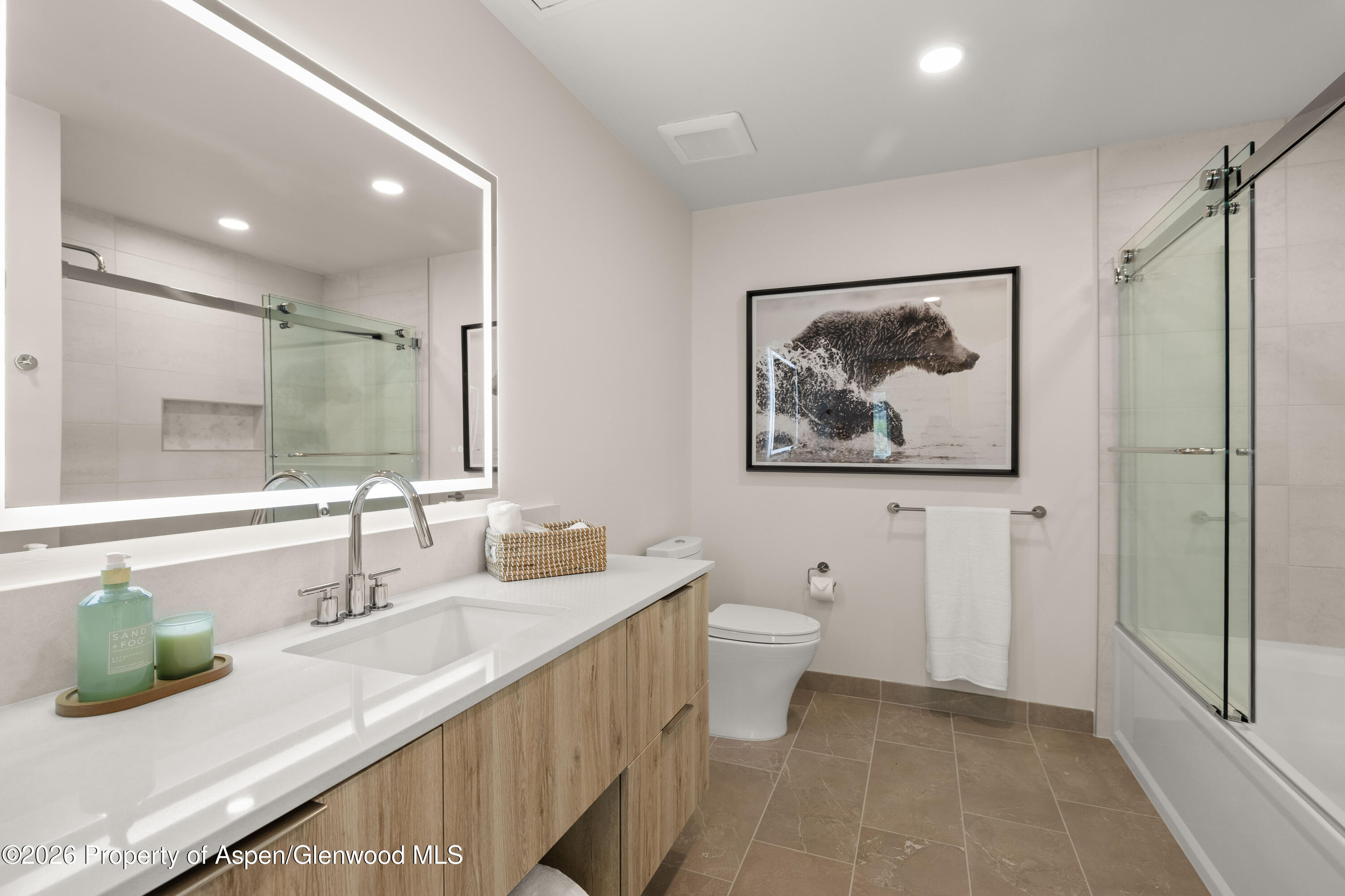 85 Kodiak Drive, Unit 304 Basalt, CO 81621 - Photo 12 of 21 a bathroom with a double vanity sink and a mirror