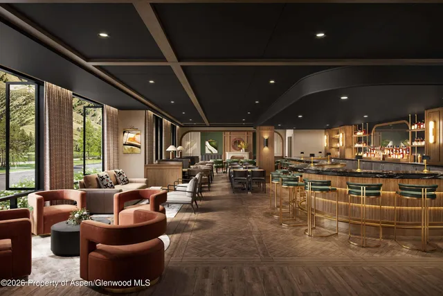 a living room with lots of furniture and chandelier