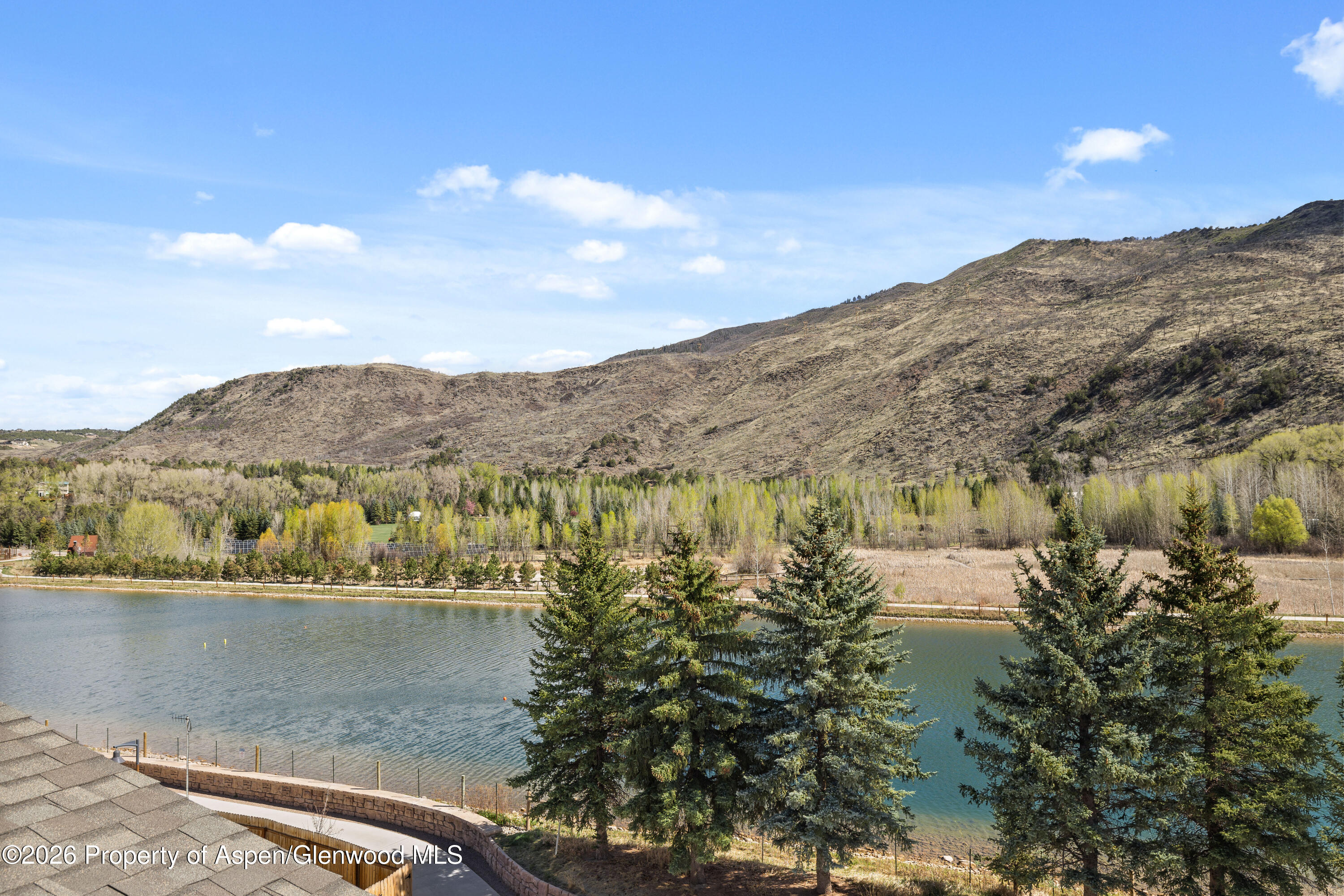85 Kodiak Drive, Unit 304 Basalt, CO 81621 - Photo 8 of 21 a view of lake with mountain