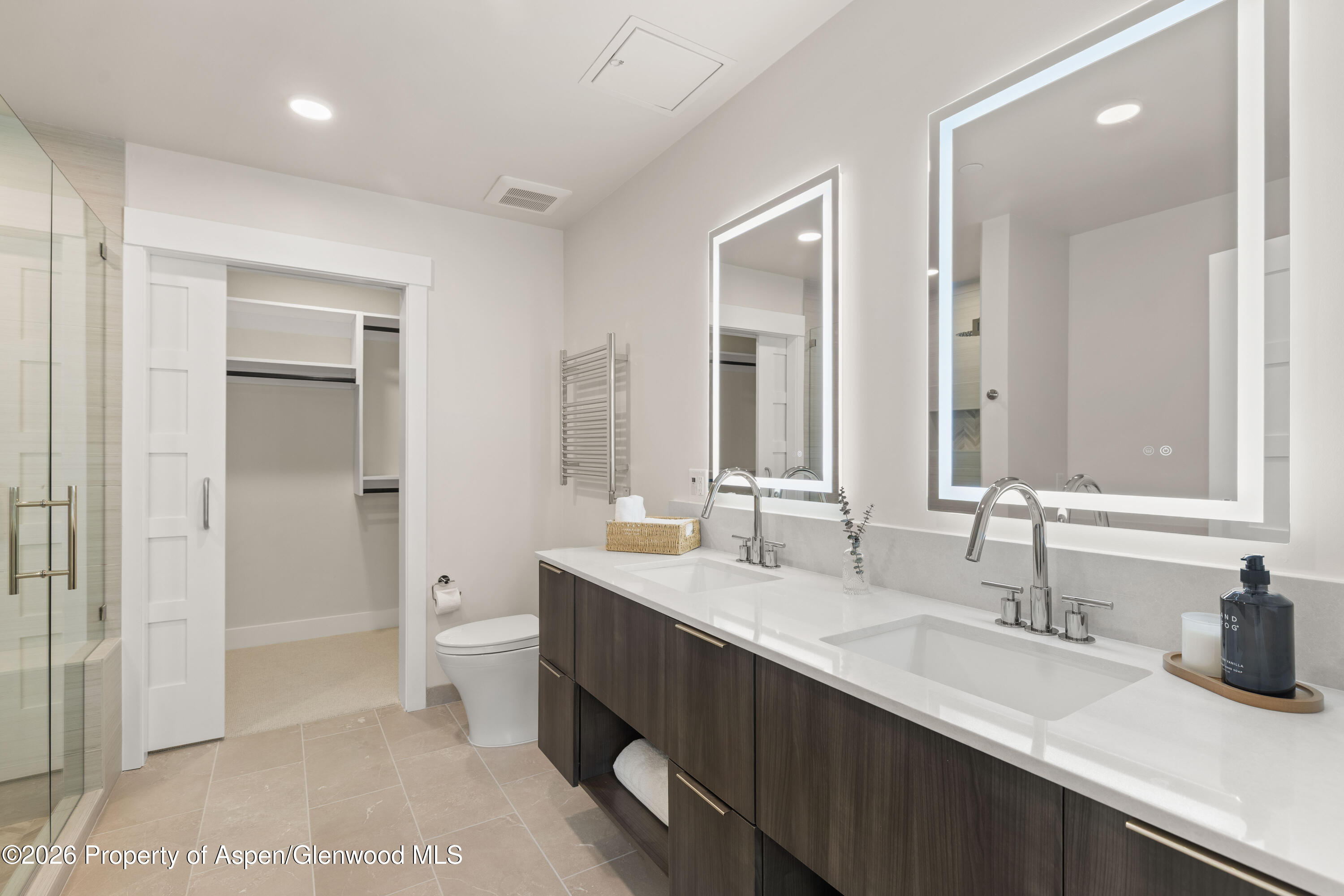 85 Kodiak Drive, Unit 304 Basalt, CO 81621 - Photo 10 of 21 a bathroom with a double vanity sink mirror and double