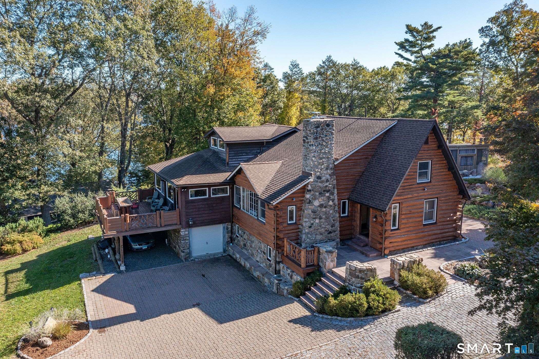 28 Fox Run New Fairfield, CT 06812 - Photo 1 of 24 an aerial view of a house with a yard table and chairs