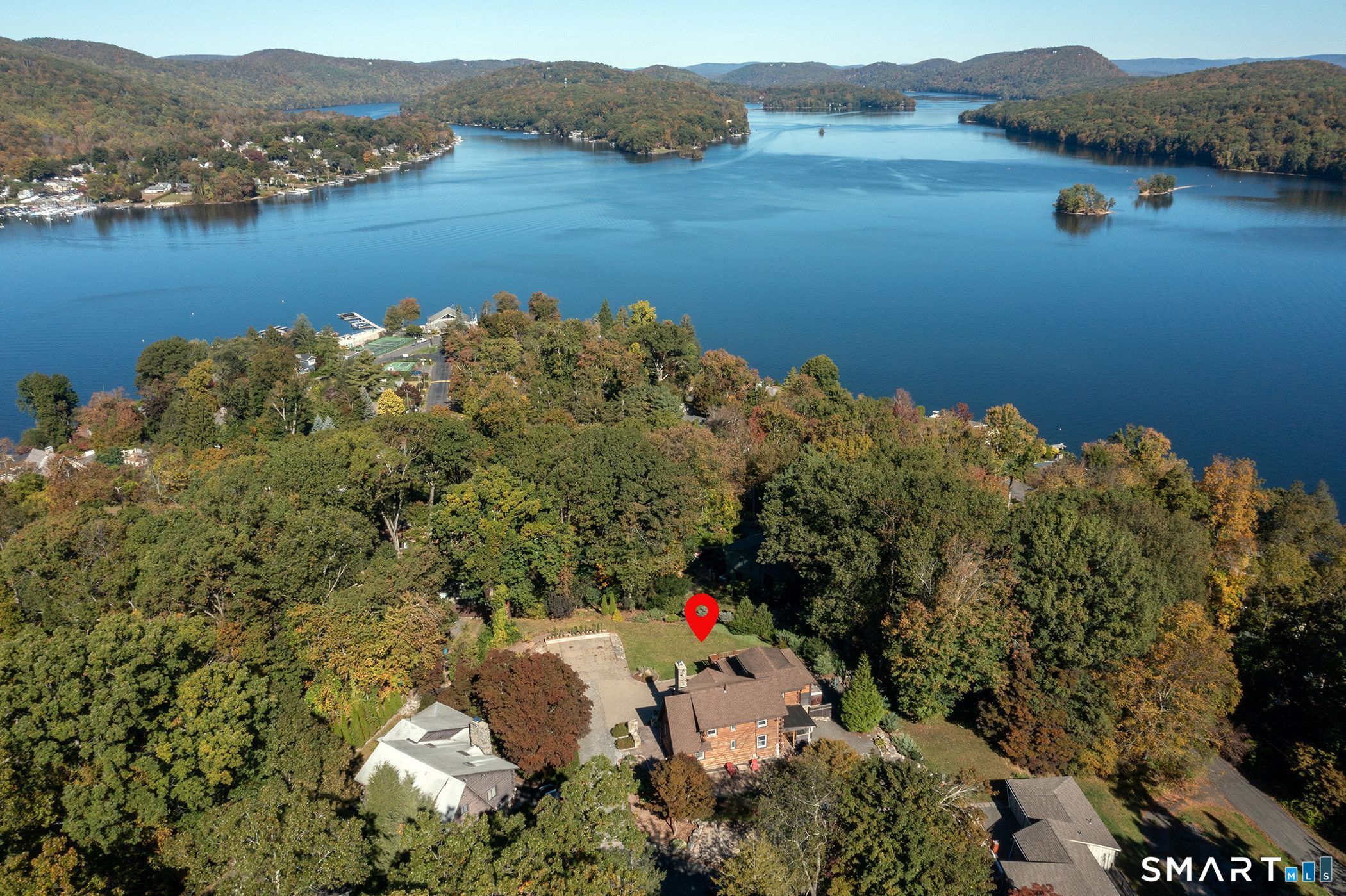 28 Fox Run New Fairfield, CT 06812 - Photo 21 of 24 an aerial view of lake residential house with outdoor space and seating