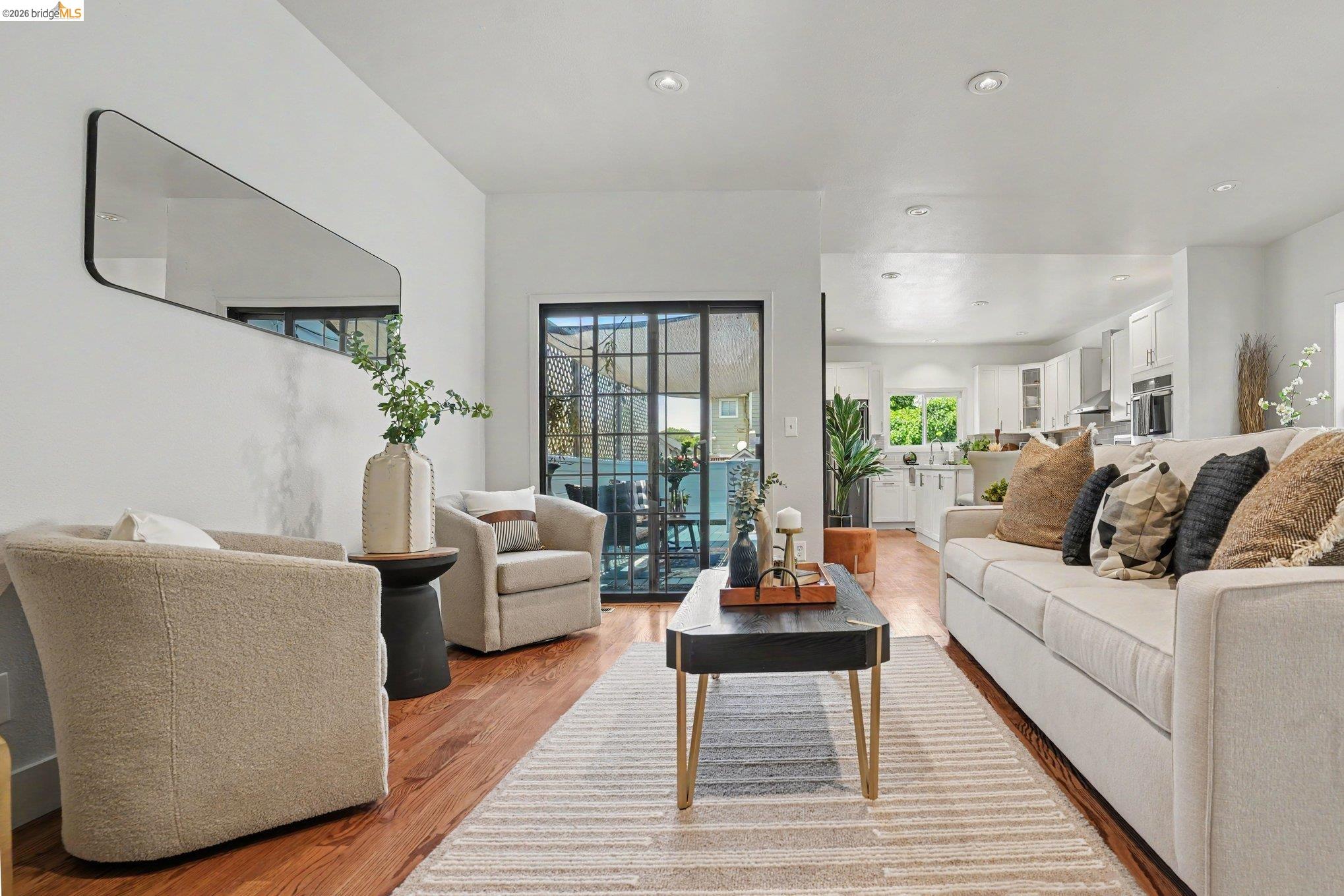 1433 Myrtle Street Oakland, CA 94607 - Photo 4 of 25 Living space featuring wood-finish flooring and recessed lighting