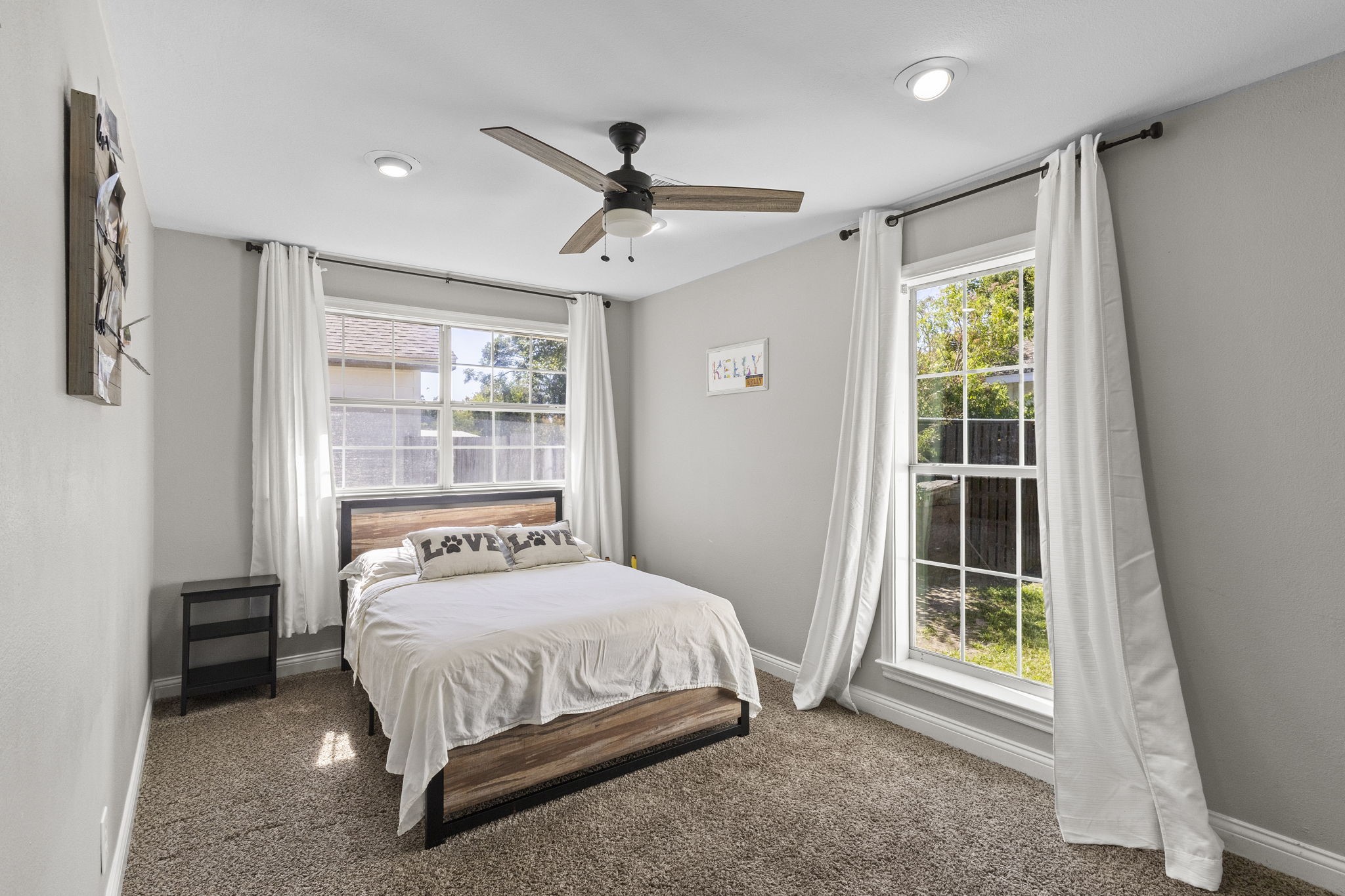 1006 Montgomery Street Port Neches, TX 77651 - Photo 12 of 29 a bedroom with a bed and a window