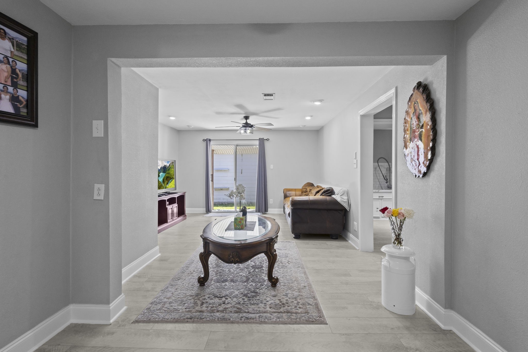 1006 Montgomery Street Port Neches, TX 77651 - Photo 17 of 29 a living room with furniture and a rug
