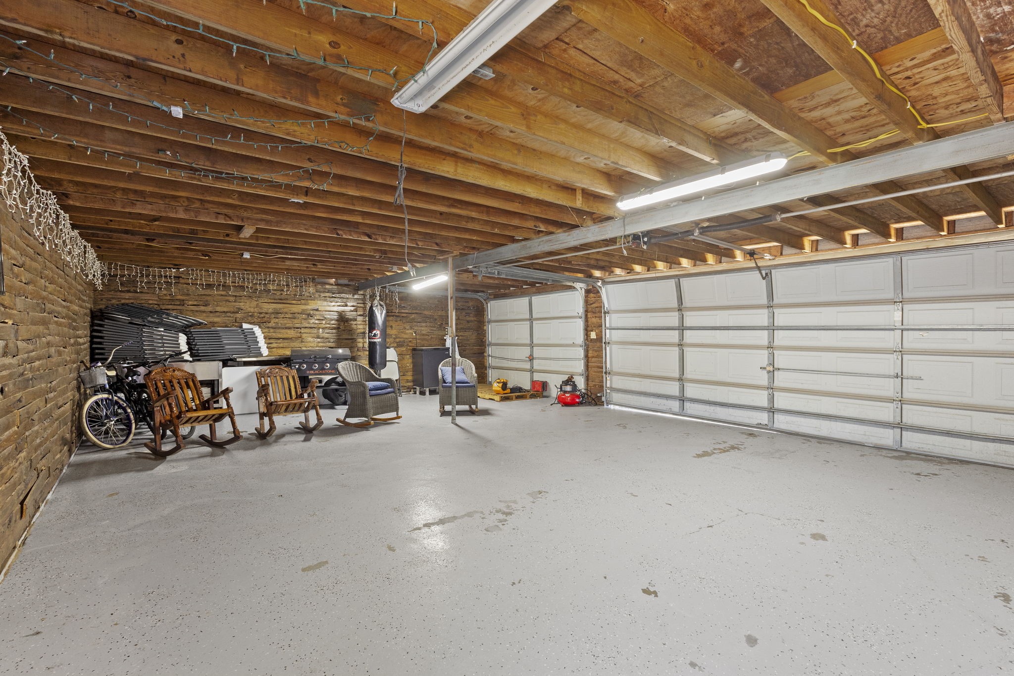 1006 Montgomery Street Port Neches, TX 77651 - Photo 28 of 29 a view of a garage with parked cars