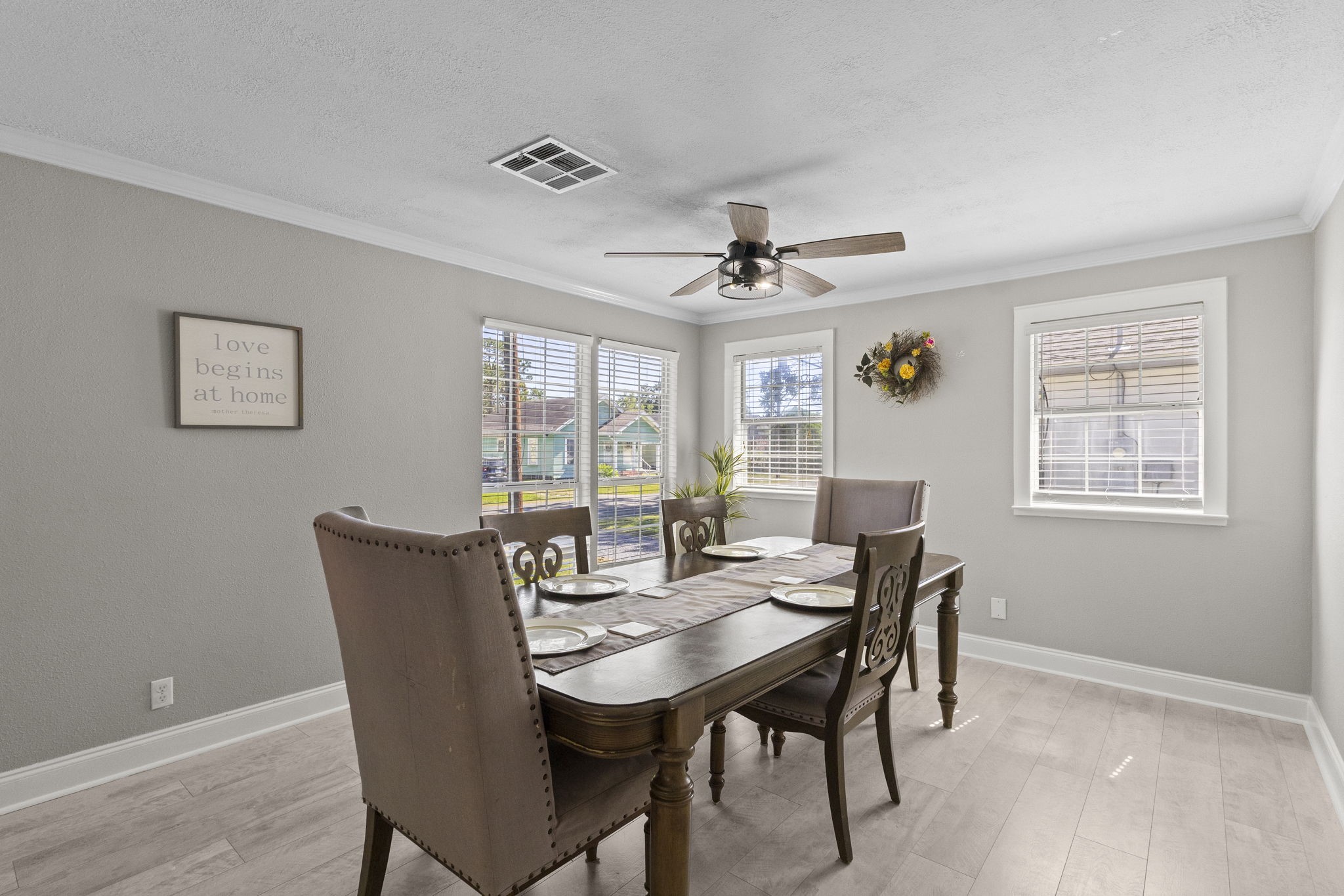 1006 Montgomery Street Port Neches, TX 77651 - Photo 3 of 29 a view of a dining room with furniture window and wooden floor