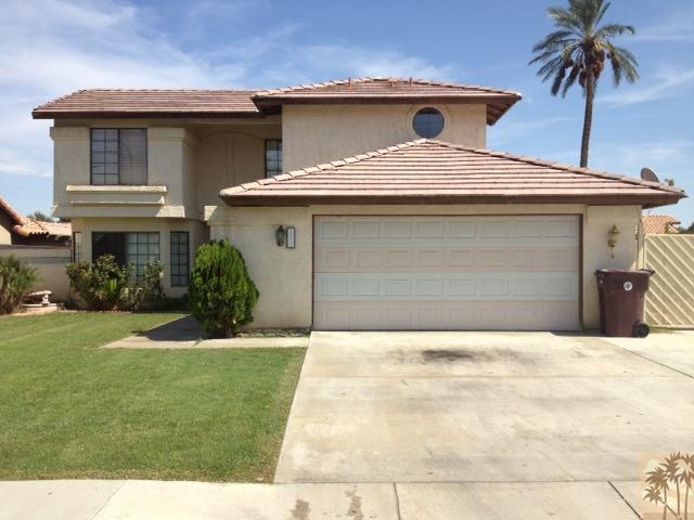 45784 Sutter Creek Road Indio, CA 92201 - Photo 1 of 3 a front view of a house with a yard