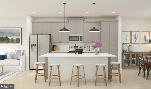 a kitchen with a table and chairs
