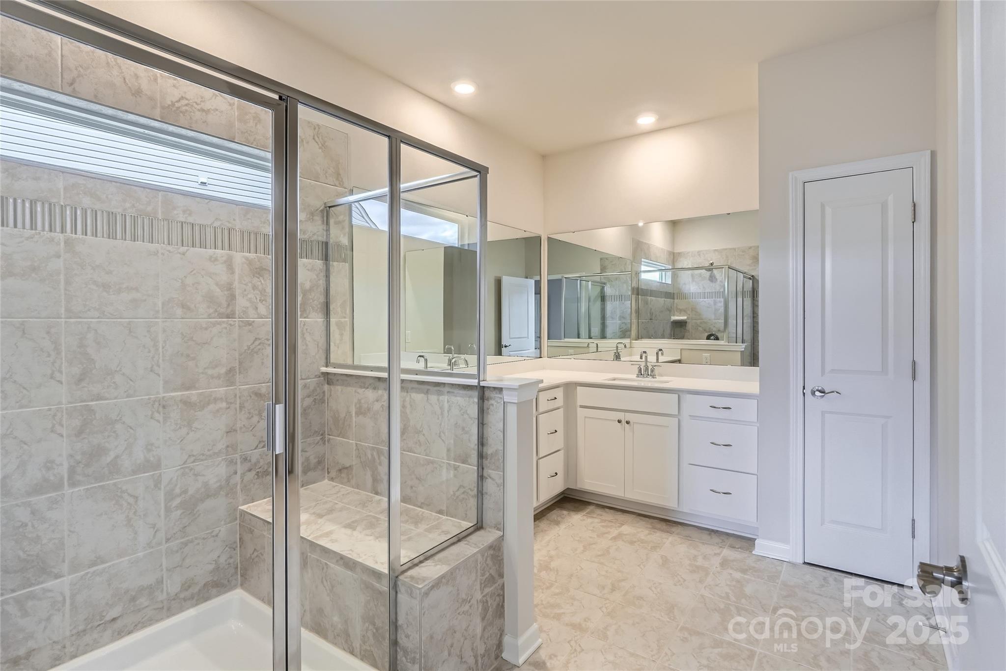 4469 Doyle Rdg Road Maiden, NC 28650 - Photo 8 of 14 a bathroom with a granite countertop sink mirror and shower