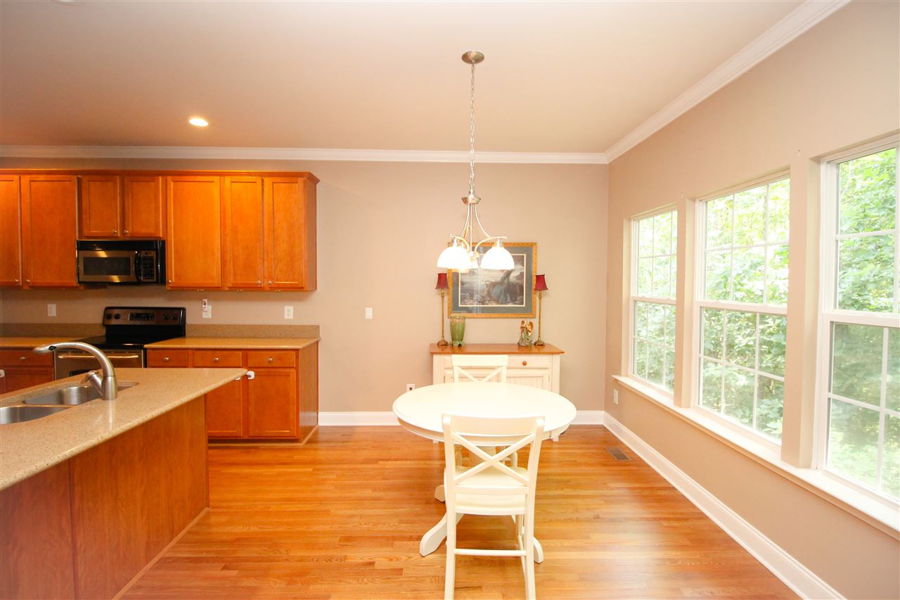 201 Riley Oaks Lane Apex, NC 27539 - Photo 10 of 29 Spacious breakfast area off of kitchen for mornings with the family! Breakfast Area