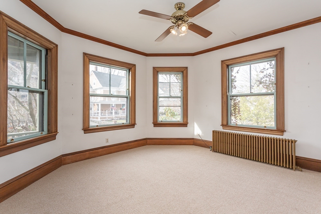 445 Madison Street Fall River, MA 02720 - Photo 11 of 42 a view of an empty room with a window