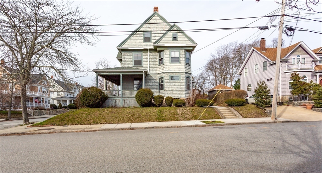 445 Madison Street Fall River, MA 02720 - Photo 5 of 42 a view of a house with a snow in the background
