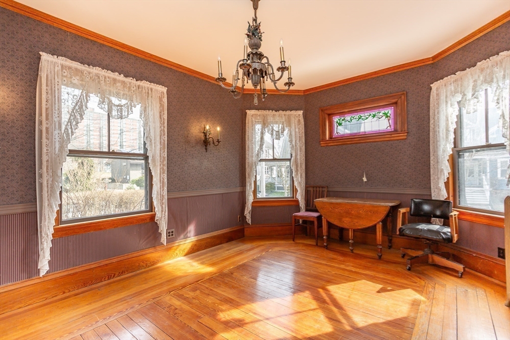 445 Madison Street Fall River, MA 02720 - Photo 8 of 42 a outdoor living space with furniture and a chandelier