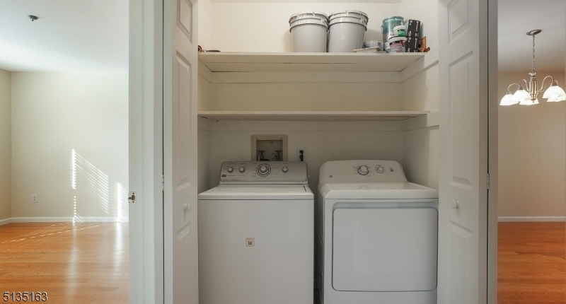 250 Potomac Drive Bernards, NJ 07920 - Photo 17 of 22 a bathroom with a sink and washer dryer