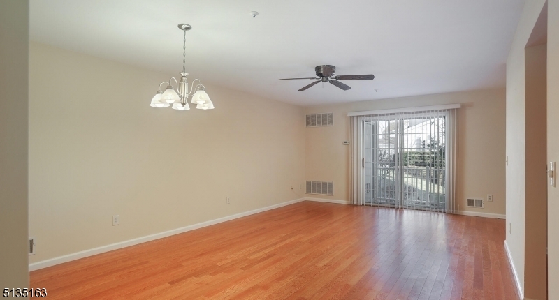 250 Potomac Drive Bernards, NJ 07920 - Photo 10 of 22 a view of empty room with wooden floor and fan