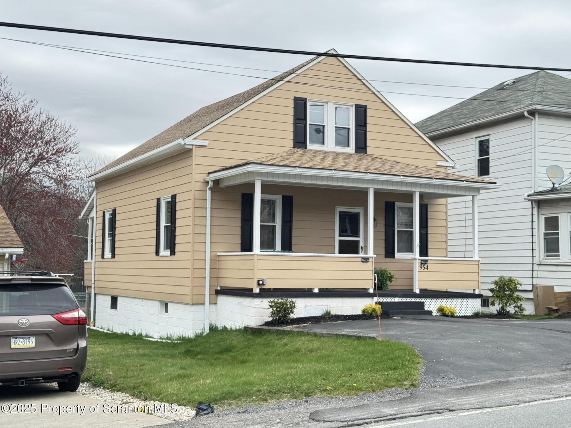 954 Lattimer Road Hazleton, PA 18202 - Photo 3 of 16 a front view of a house with a yard