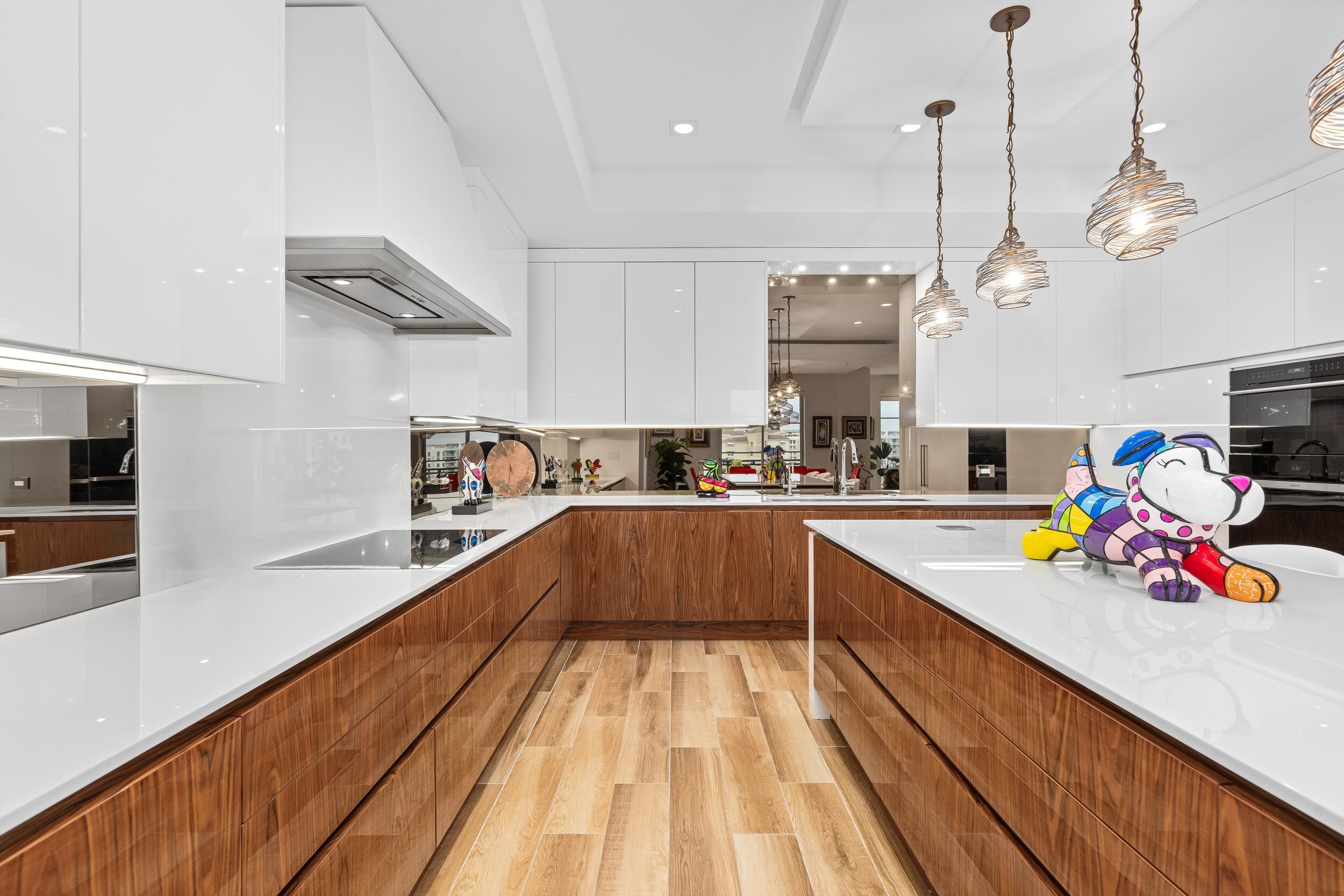 155 East Boca Raton Road, Unit 812 Boca Raton, FL 33432 - Photo 15 of 54 a kitchen with stainless steel appliances granite countertop a stove and cabinets
