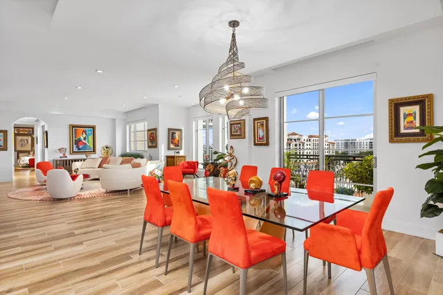 a outdoor space with lots of furniture and wooden floor