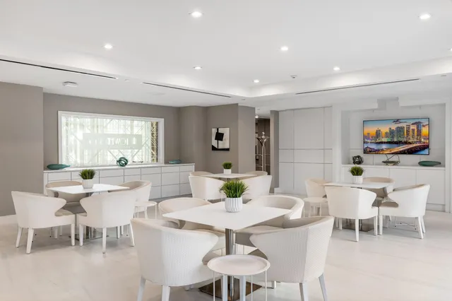 a kitchen with a sink and a refrigerator