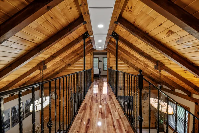 a view of balcony with wooden floor