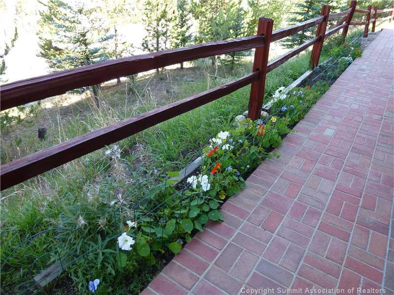 70 Evergreen Road, Unit 104 Dillon, CO 80435 - Photo 15 of 22 a view of a garden