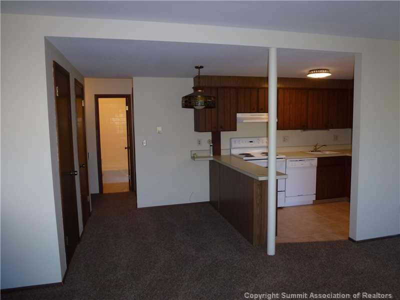 70 Evergreen Road, Unit 104 Dillon, CO 80435 - Photo 8 of 22 a view of a kitchen from the hallway